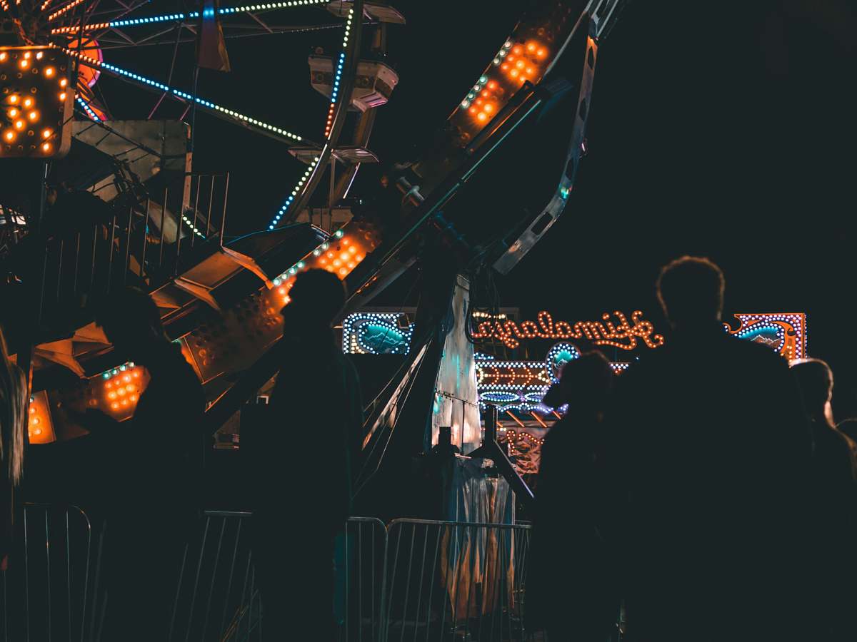 northern arizona university silhouette of person near Ferris wheel flagstaff